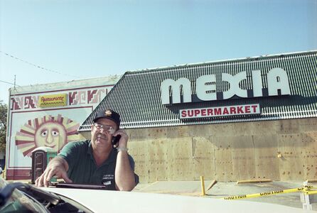 McClurg outside a boarded-up Mexia Supermarket.