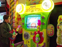 A photo of the arcade cabinet showing gameplay of Stage 4.