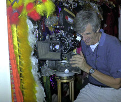 Director of Photography, Jaroslav Vodehnal, poses at the 16mm camera that was used to film the movie.