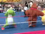 Yoshi and Donkey Kong fighting.