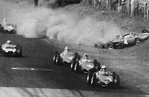 Disaster strikes as von Trip's Ferrari heads towards the crowd.