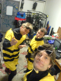 A photo with some of the crew in bee costumes