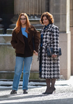 Set photo of Barbra Gordon standing next to an unnamed character played by Rebecca Front.