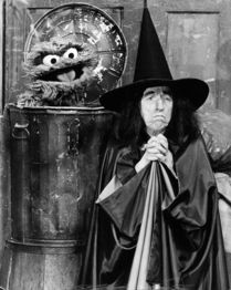 Margaret Hamilton as the Wicked Witch of the West, alongside Oscar the Grouch.