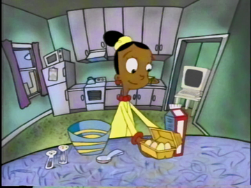 Screenshot of Jackie making breakfast. A scene that is not in the 2002 version.