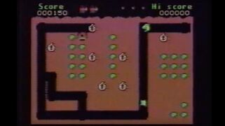 A screen capture from the Videoway game Taupe, a port/bootleg of the arcade game Mr. Do!.