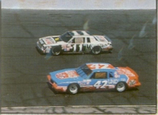 Waltrip (11) duelling with Kyle Petty (42).