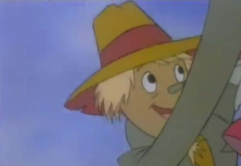 File:Scarecrow holding onto the umbrella.png