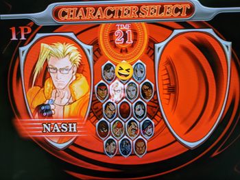 The game's character selection screen. The secret KOF character is covered with a smiley.