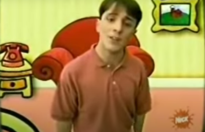 Steve in the pilot, wearing his red shirt, instead of his iconic green striped shirt.
