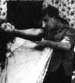 Part of a still from the film, with "The Creation" attacking.