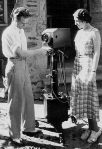 Farnsworth and Mable Bernstein inspecting one of the portable television cameras.
