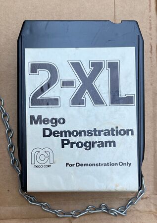 The legendary "Mego Demonstration Tape", with a chain to prevent it from being stolen for the store display unit.