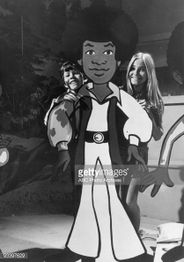 A still showing Bobby Brady, Marcia Brady and a member of the Jackson 5.