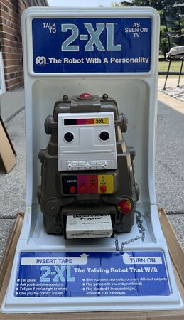 A Mego 2-XL in its store display unit with the legendary "Mego Demonstration tape", which was only used for store demonstrations.