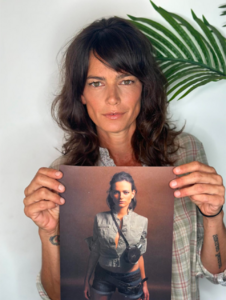 Leticia Sardá holding the photo used for Celebrity Number Six.