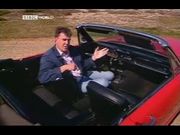 Jeremy Clarkson sat in a Ford Mustang.