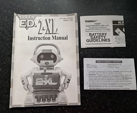 The warranty and manual for the Tiger Ed. 2-XL robot (taken from eBay listing).