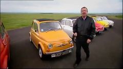 Nick Mason with a group of Fiat 500s.