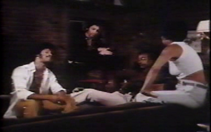Supposed still frame from Black the Ripper. This apparently was from a scene where a group of characters are hanging out.