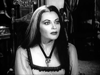 One of six screenshots of the second pilot version of My Fair Munster, taken from America's First Family of Fright, again featuring Lily.