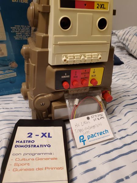 Close-up of the Italian Mego 2-XL robot and the "Nastro Dimostrativo" tape. This shows the Italian-language buttons.