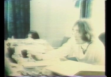 Footage of John Lennon during an interview at Apple Corps.