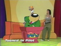 Screenshot of the unnamed host and a cartoon character, as taken from the Best of Nickelodeon Studios video.