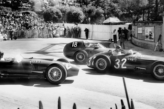 Fangio narrowly ahead of Moss and Collins.