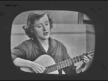 Photograph of Connie Converse performing her original compositions.