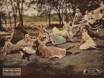 Another lobby card for the film depicting a scene.