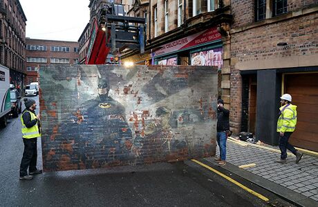 Set photo of a mural showing Batman and Robin.